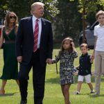 President Donald Trump with Melania, Barron and grandchildren.